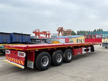 TITAN Flatbed Tri Axle Truck Trailer for Sale in Tanzania - نصف مقطورة مسطحة: صور 3 TITAN Flatbed Tri Axle Truck Trailer for Sale in Tanzania - نصف مقطورة مسطحة: صور 3