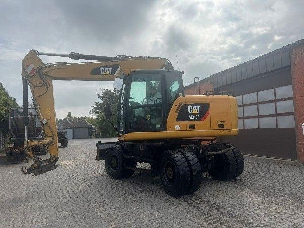 CAT M318F - حفارة على عجلات: صور 2 CAT M318F - حفارة على عجلات: صور 2