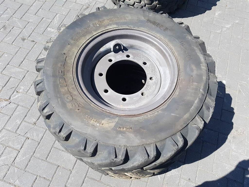 Ahlmann AS50-Solideal 12.5-18-Dunlop 12.5R18-Tire/Reifen - الإطارات والجنوط - آلات البناء: صور 3 Ahlmann AS50-Solideal 12.5-18-Dunlop 12.5R18-Tire/Reifen - الإطارات والجنوط - آلات البناء: صور 3