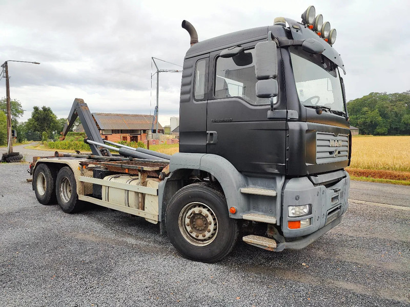 MAN TGA 26.350 6x4 Container AJK Euronorm 3 - شاحنة ذات الخطاف: صور 1 MAN TGA 26.350 6x4 Container AJK Euronorm 3 - شاحنة ذات الخطاف: صور 1