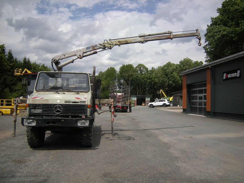 Mercedes-Benz Unimog U1250 mit Kran MKG 105 - قلاب صغير: صور 1 Mercedes-Benz Unimog U1250 mit Kran MKG 105 - قلاب صغير: صور 1