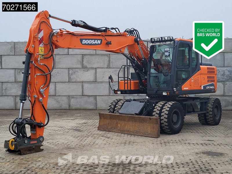 Doosan DX140 W-5 OIL QUICK - GERMAN - حفارة على عجلات: صور 1 Doosan DX140 W-5 OIL QUICK - GERMAN - حفارة على عجلات: صور 1