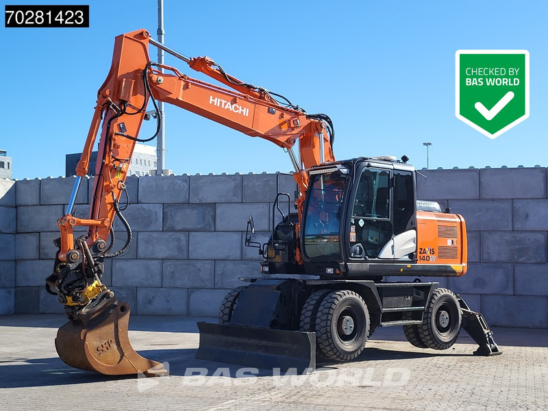 Hitachi ZX140W -5 OUTRIGGERS + BLADE - حفارة على عجلات: صور 1 Hitachi ZX140W -5 OUTRIGGERS + BLADE - حفارة على عجلات: صور 1