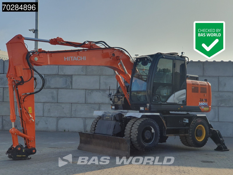 Hitachi ZX140W -6 OUTRIGGERS + BLADE - حفارة على عجلات: صور 1 Hitachi ZX140W -6 OUTRIGGERS + BLADE - حفارة على عجلات: صور 1