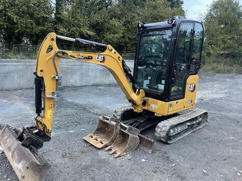 Caterpillar 302 - حفارة مصغرة: صور 1 Caterpillar 302 - حفارة مصغرة: صور 1
