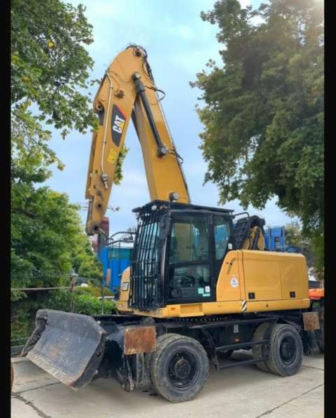 Caterpillar MH3022 - حفارة النقل والشحن: صور 1 Caterpillar MH3022 - حفارة النقل والشحن: صور 1