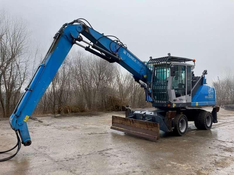 Fuchs MHL 320 - حفارة النقل والشحن: صور 1 Fuchs MHL 320 - حفارة النقل والشحن: صور 1