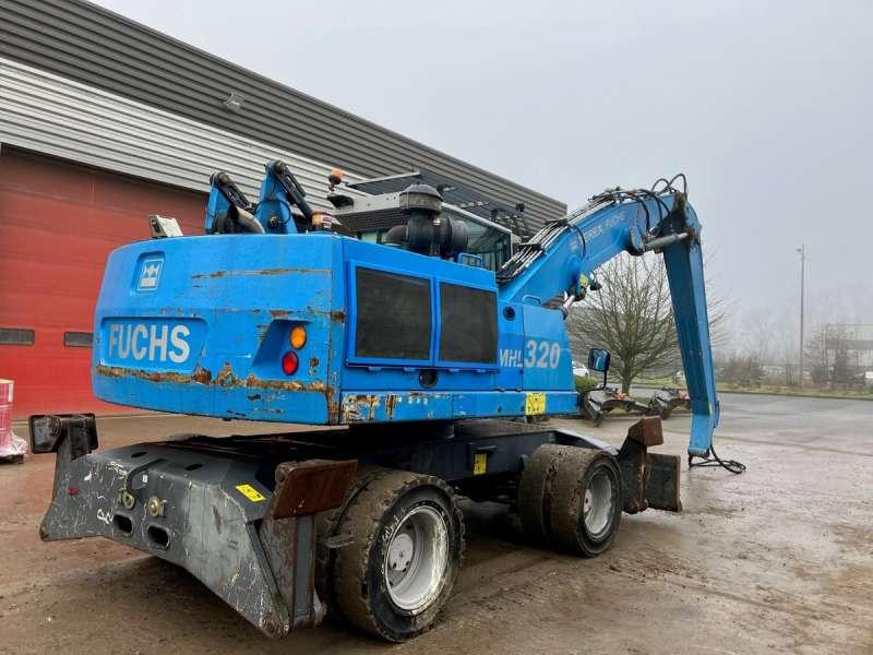 Fuchs MHL 320 - حفارة النقل والشحن: صور 3 Fuchs MHL 320 - حفارة النقل والشحن: صور 3