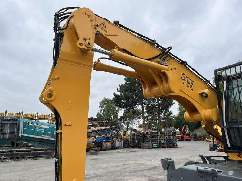 حفارة النقل والشحن Liebherr A316 LITRONIC: صور 20