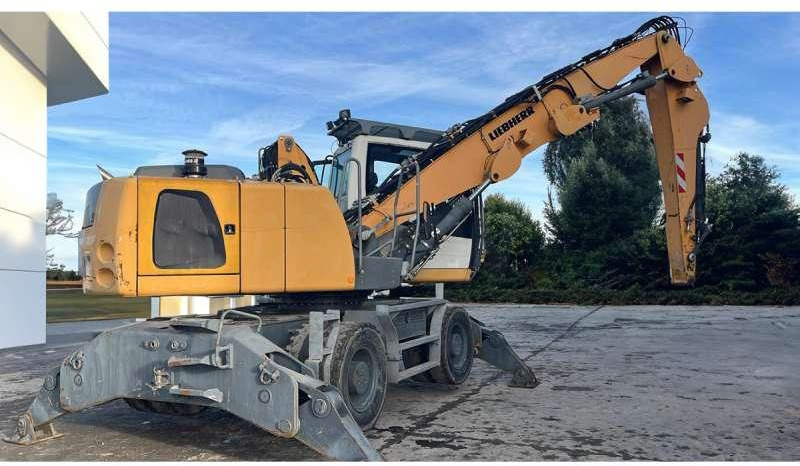 Liebherr LH 22 M LITRONIC - حفارة النقل والشحن: صور 5 Liebherr LH 22 M LITRONIC - حفارة النقل والشحن: صور 5