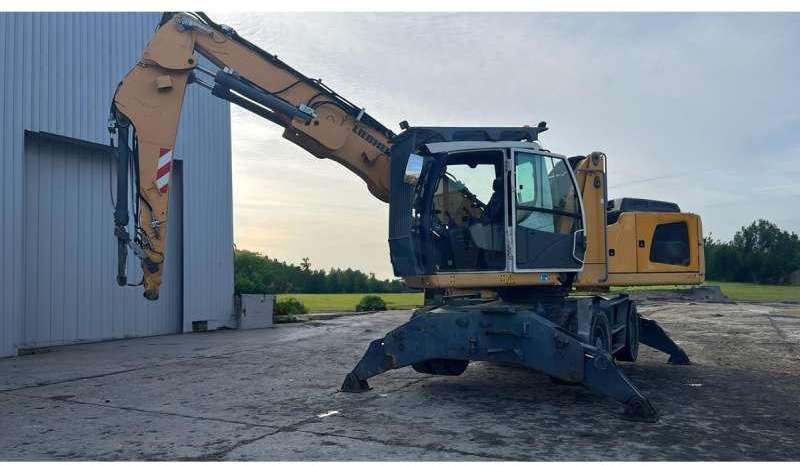 Liebherr LH 22 M LITRONIC - حفارة النقل والشحن: صور 1 Liebherr LH 22 M LITRONIC - حفارة النقل والشحن: صور 1