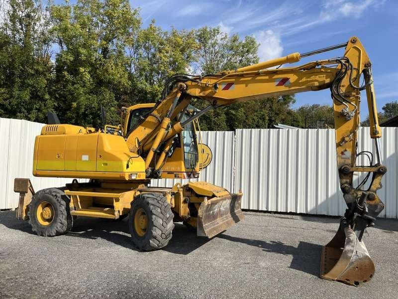 Volvo Pelle sur Pneus EW140D - حفارة على عجلات: صور 1 Volvo Pelle sur Pneus EW140D - حفارة على عجلات: صور 1