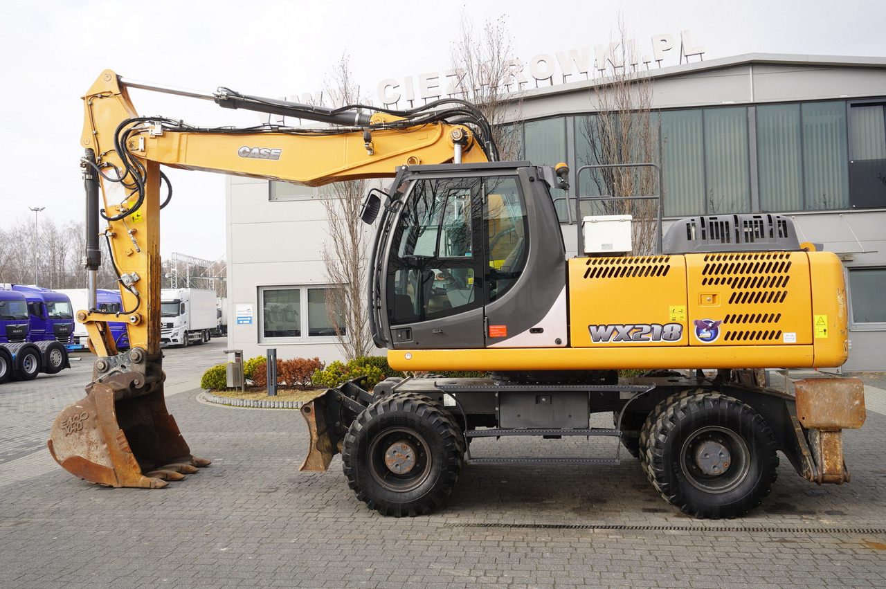 CASE WX218 / 23t wheeled excavator / 3 times folding arm - حفارة على عجلات: صور 1 CASE WX218 / 23t wheeled excavator / 3 times folding arm - حفارة على عجلات: صور 1