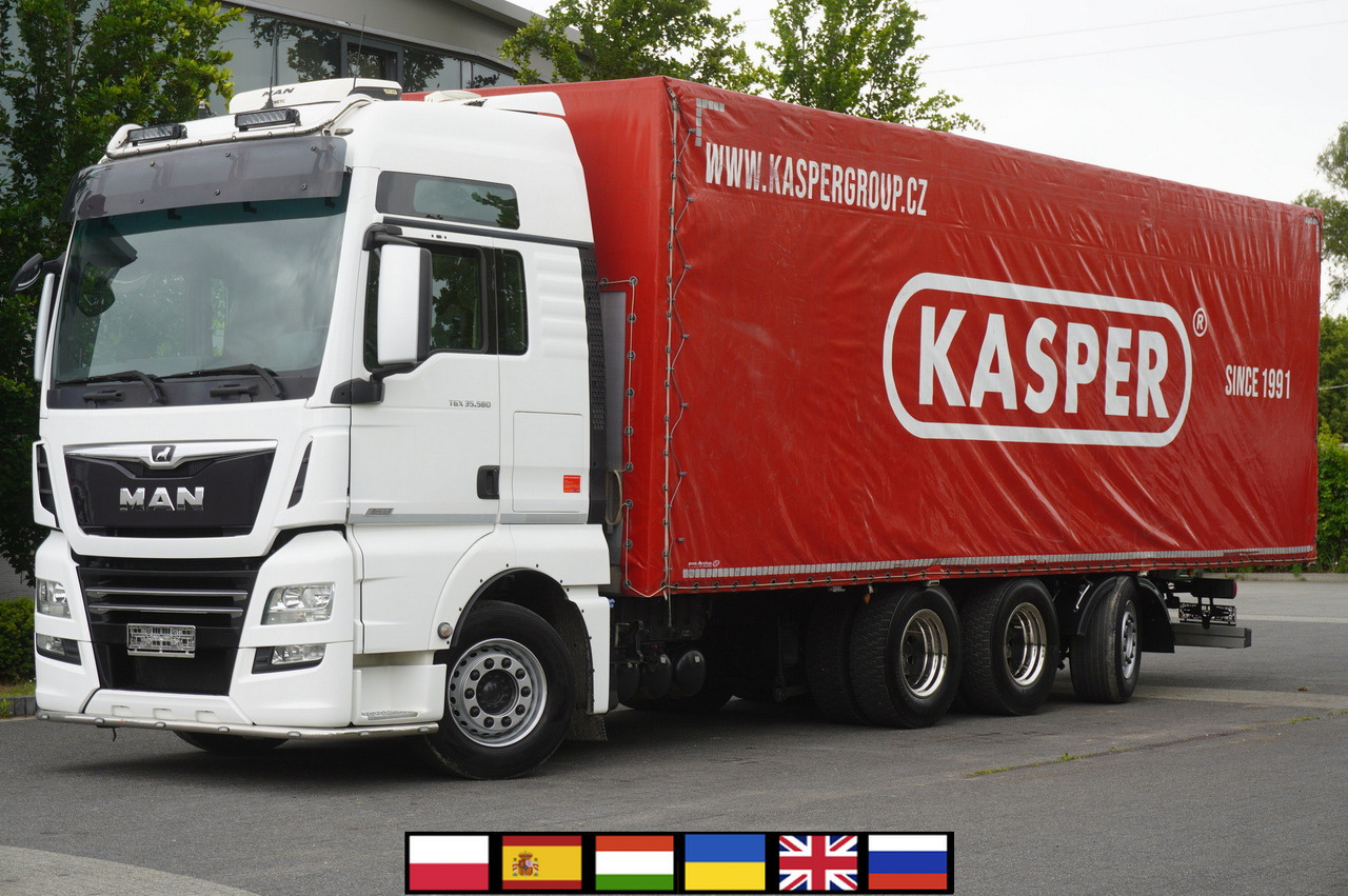 MAN TGX 35.580 E6 8x4 /4 / 23 EPAL tarp superstructure / 4th axle steered - شاحنة ستارة: صور 1 MAN TGX 35.580 E6 8x4 /4 / 23 EPAL tarp superstructure / 4th axle steered - شاحنة ستارة: صور 1