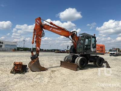HITACHI ZX140W-3 - حفارة على عجلات: صور 1 HITACHI ZX140W-3 - حفارة على عجلات: صور 1