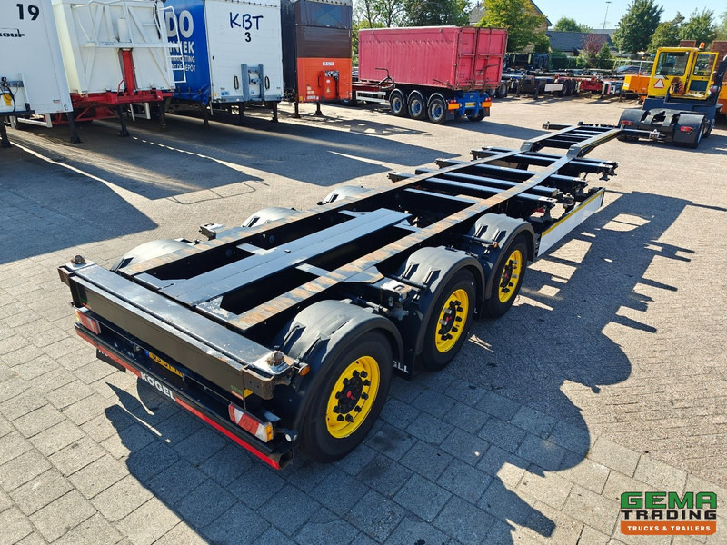 Kögel PORT 40 SIMPLEX 20 3-Assen SAF - Schijfremmen - 20/30/40FT Aansluiting - Achterschuiver - شاحنات الحاويات / جسم علوي قابل للتغيير نصف مقطورة: صور 4 Kögel PORT 40 SIMPLEX 20 3-Assen SAF - Schijfremmen - 20/30/40FT Aansluiting - Achterschuiver - شاحنات الحاويات / جسم علوي قابل للتغيير نصف مقطورة: صور 4