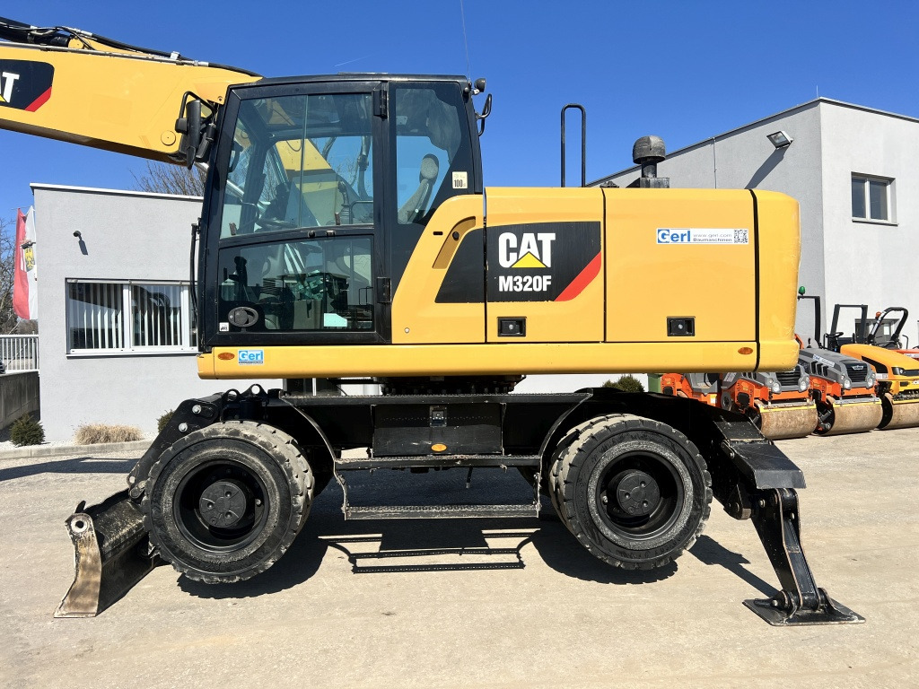 Caterpillar M 320 F (111527) - حفارة على عجلات: صور 2 Caterpillar M 320 F (111527) - حفارة على عجلات: صور 2