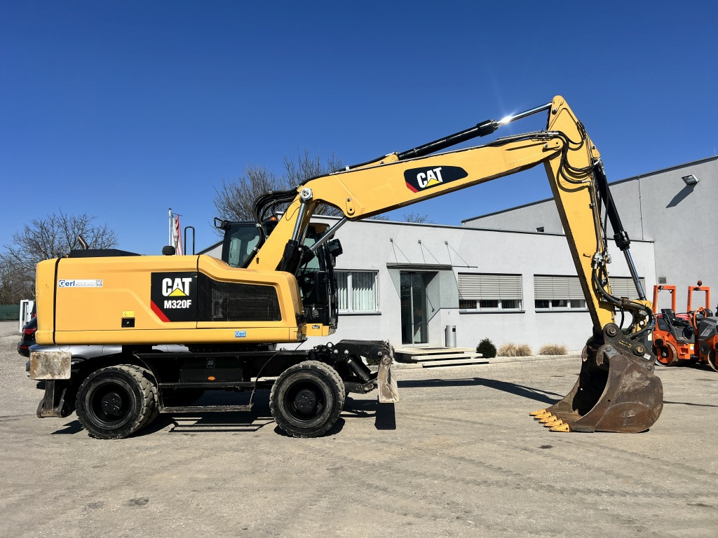 Caterpillar M 320 F (111527) - حفارة على عجلات: صور 4 Caterpillar M 320 F (111527) - حفارة على عجلات: صور 4