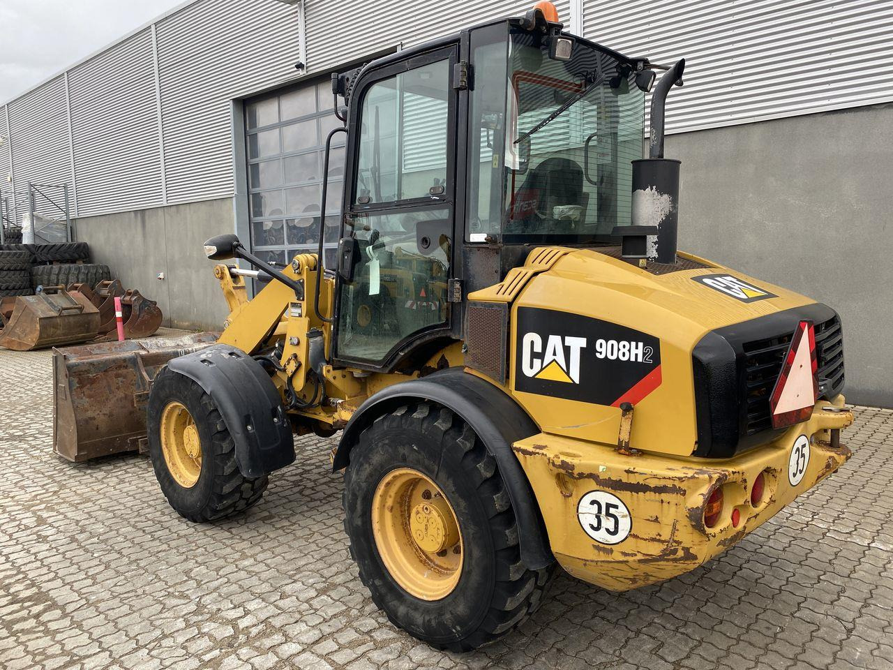 Caterpillar 908 H2 - لودر مفصلي صغير: صور 2 Caterpillar 908 H2 - لودر مفصلي صغير: صور 2
