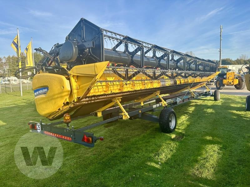 New Holland Schneidwerk 10,70 m - حصادة شاملة - الرأس: صور 1 New Holland Schneidwerk 10,70 m - حصادة شاملة - الرأس: صور 1