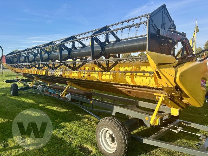 New Holland Schneidwerk 10,70 m - حصادة شاملة - الرأس: صور 3 New Holland Schneidwerk 10,70 m - حصادة شاملة - الرأس: صور 3