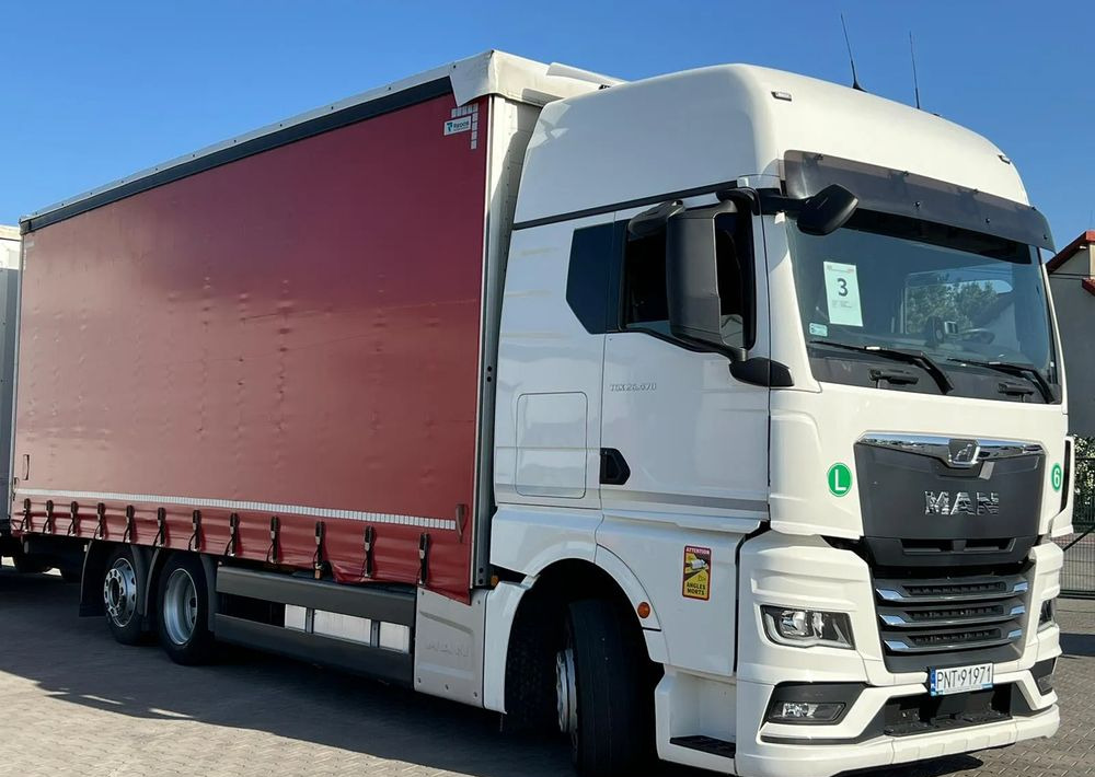 MAN TGX 26.470 z przyczepą Redos - شاحنة ستارة: صور 3 MAN TGX 26.470 z przyczepą Redos - شاحنة ستارة: صور 3