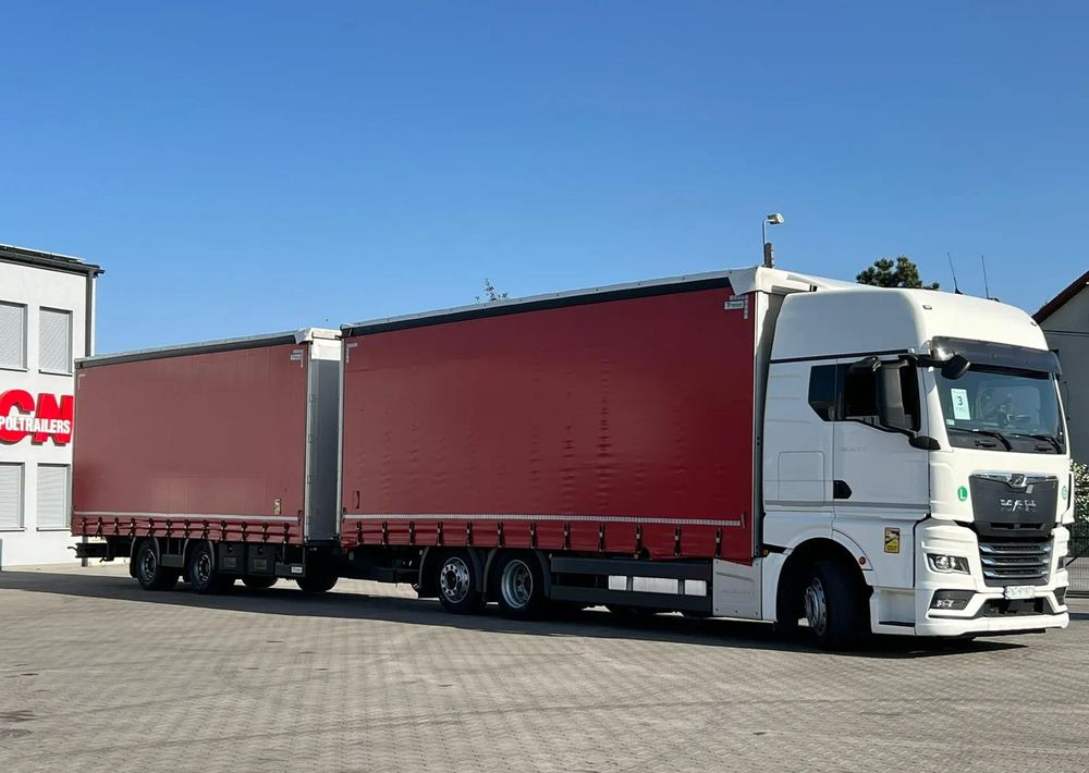 MAN TGX 26.470 z przyczepą Redos - شاحنة ستارة: صور 2 MAN TGX 26.470 z przyczepą Redos - شاحنة ستارة: صور 2