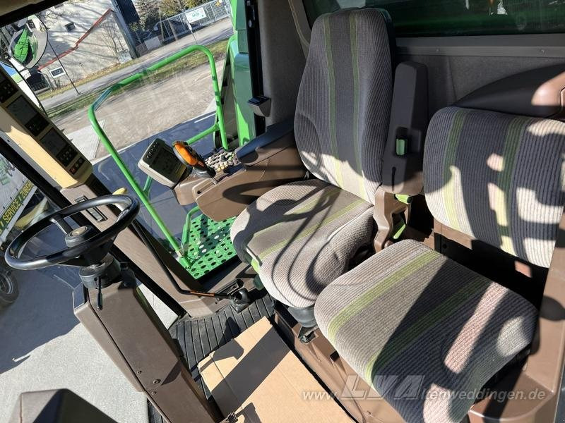 حصادة شاملة John Deere T660: صور 6