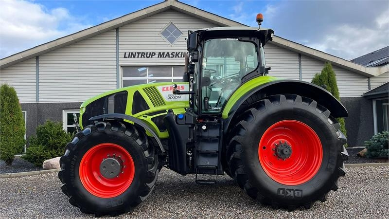 Claas Axion 930 CMatic Med næsten nye dæk, frontlift og - جرار: صور 1 Claas Axion 930 CMatic Med næsten nye dæk, frontlift og - جرار: صور 1
