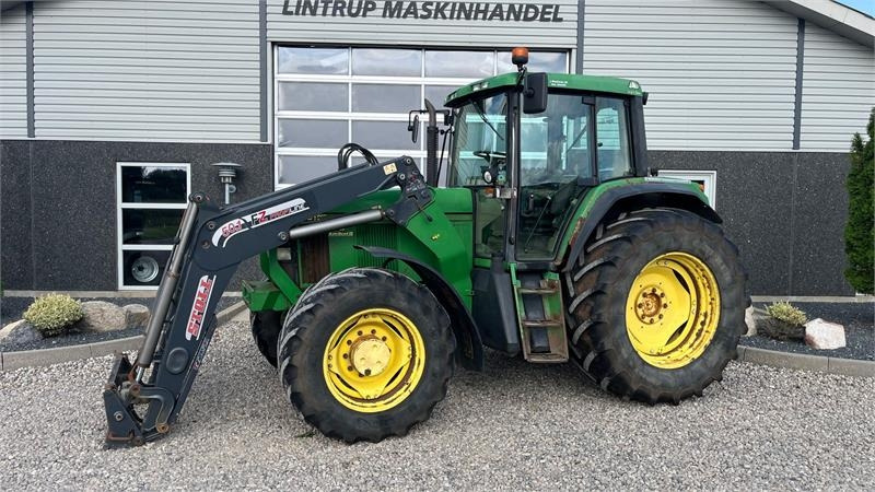 John Deere 6910 Auto Quad II-TLS Med frontlæsser - جرار: صور 1 John Deere 6910 Auto Quad II-TLS Med frontlæsser - جرار: صور 1