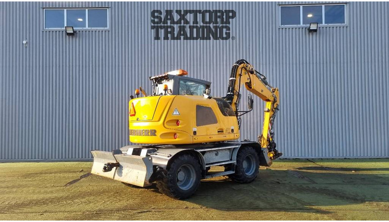 Liebherr A910 Compact, Hjulgrävare - حفارة على عجلات: صور 5 Liebherr A910 Compact, Hjulgrävare - حفارة على عجلات: صور 5