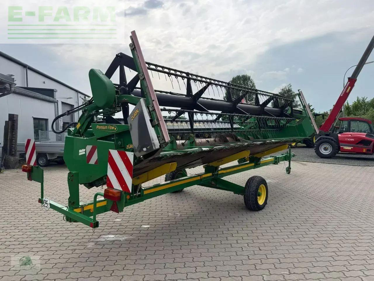 حصادة شاملة John Deere t560i hm: صور 13