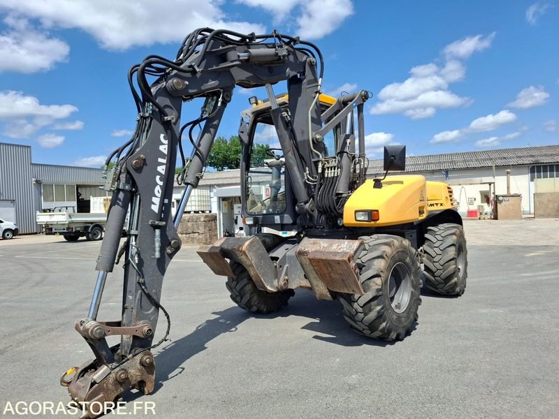 PELLE SUR PNEUS MECALAC 12MTX 4.5 - 2013 / 8 700 HEURES - حفارة: صور 2 PELLE SUR PNEUS MECALAC 12MTX 4.5 - 2013 / 8 700 HEURES - حفارة: صور 2