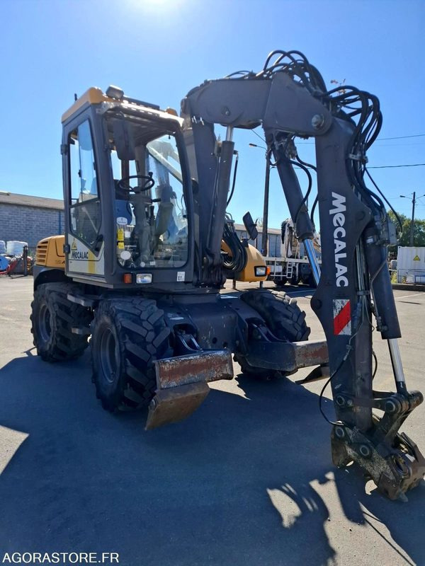Pelle sur pneus MECALAC 12MTX - N° série 42770 - 2014 - 11400 heures - حفارة: صور 5 Pelle sur pneus MECALAC 12MTX - N° série 42770 - 2014 - 11400 heures - حفارة: صور 5