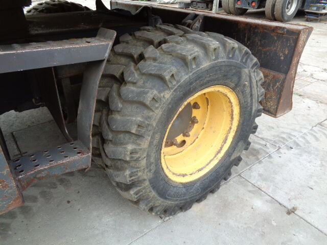 New Holland MH 4.6 - حفارة على عجلات: صور 5 New Holland MH 4.6 - حفارة على عجلات: صور 5