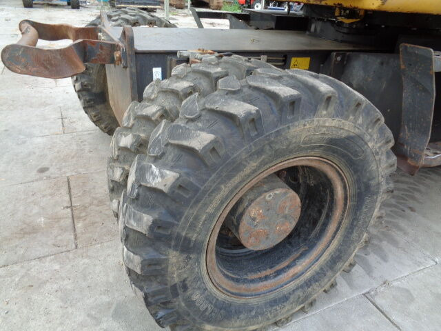 New Holland MH 4.6 - حفارة على عجلات: صور 4 New Holland MH 4.6 - حفارة على عجلات: صور 4