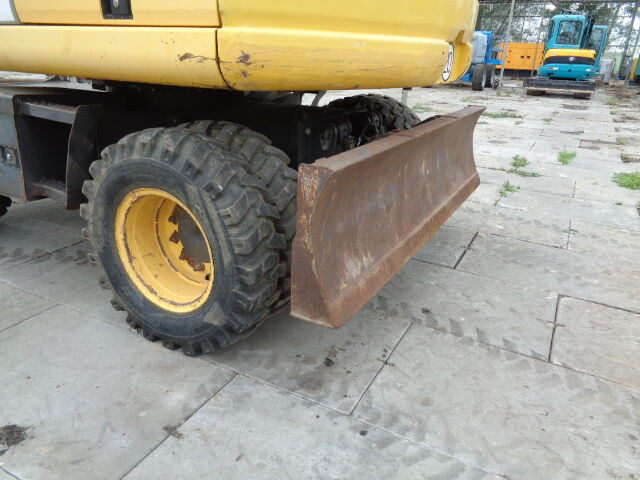 حفارة على عجلات New Holland MH 4.6: صور 11