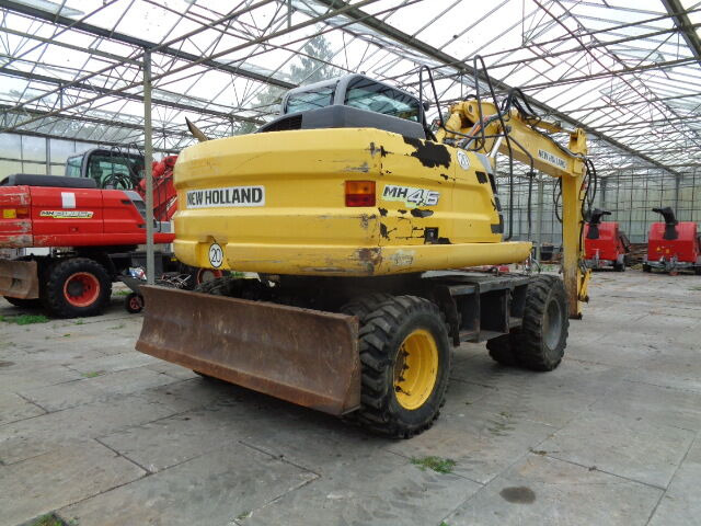 حفارة على عجلات New Holland MH 4.6: صور 12