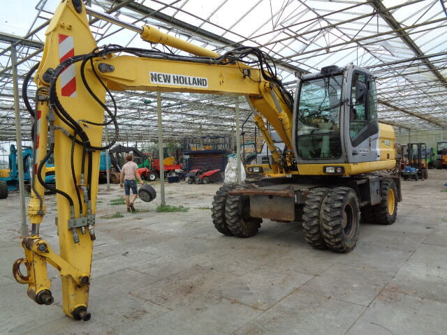 New Holland MH 4.6 - حفارة على عجلات: صور 2 New Holland MH 4.6 - حفارة على عجلات: صور 2