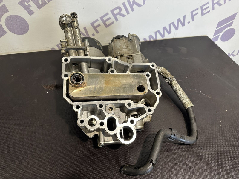 MAN oil filter housing with coolant - المحرك و قطع الغيار - شاحنة: صور 1 MAN oil filter housing with coolant - المحرك و قطع الغيار - شاحنة: صور 1