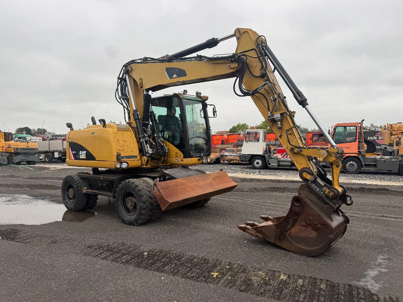Caterpillar M313D 7212 HOURS - حفارة على عجلات: صور 3 Caterpillar M313D 7212 HOURS - حفارة على عجلات: صور 3
