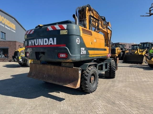 حفارة على عجلات Hyundai HW 210: صور 9