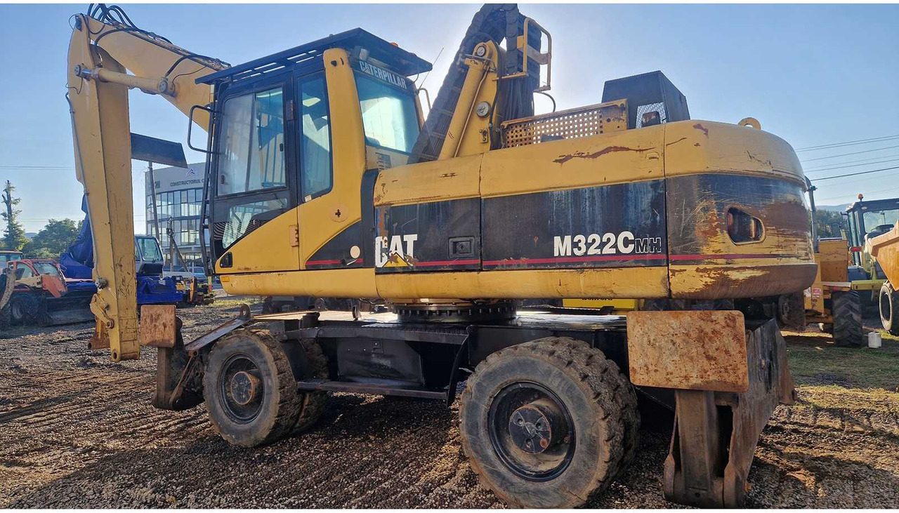 Caterpillar M322C - حفارة على عجلات: صور 5 Caterpillar M322C - حفارة على عجلات: صور 5