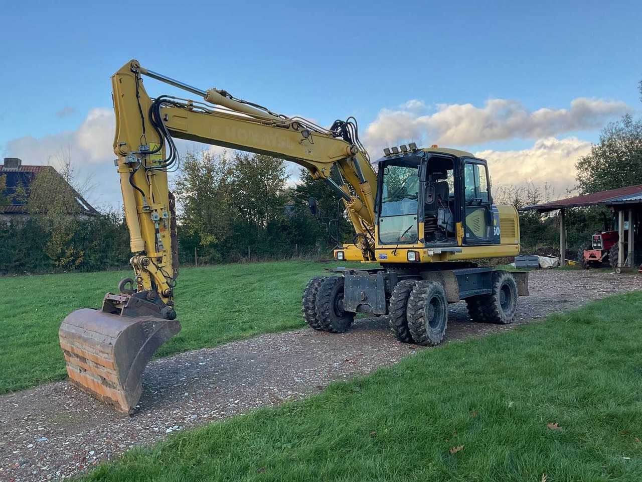 Komatsu PW160-7EO - حفارة على عجلات: صور 1 Komatsu PW160-7EO - حفارة على عجلات: صور 1