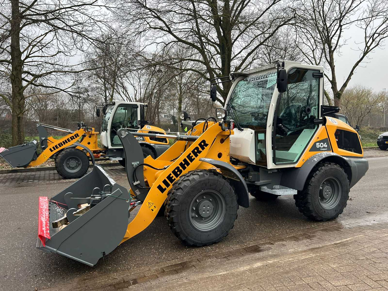 Liebherr L504 Compact - اللودر بعجل: صور 1 Liebherr L504 Compact - اللودر بعجل: صور 1