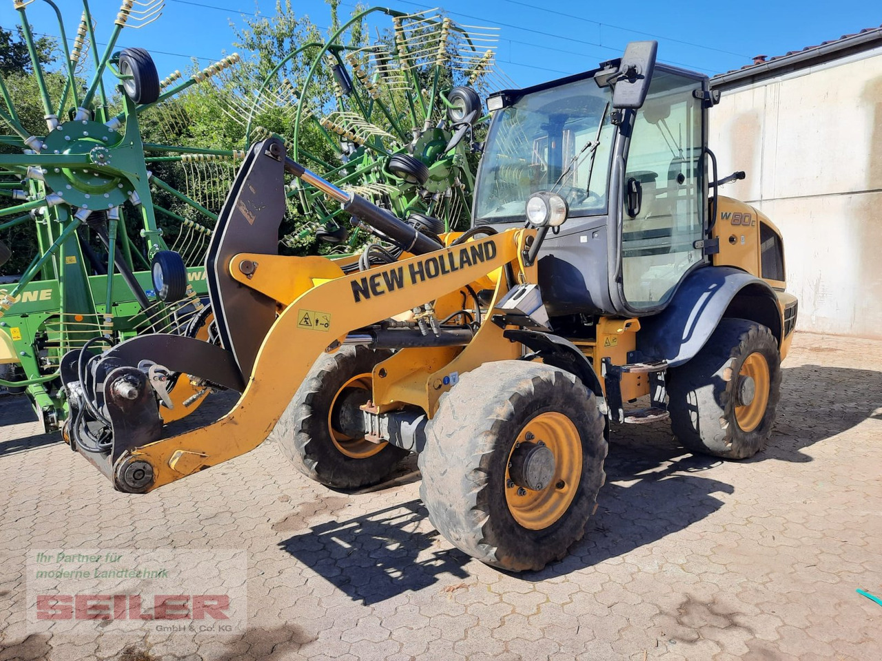 New Holland W 80 C - اللودر بعجل: صور 1 New Holland W 80 C - اللودر بعجل: صور 1
