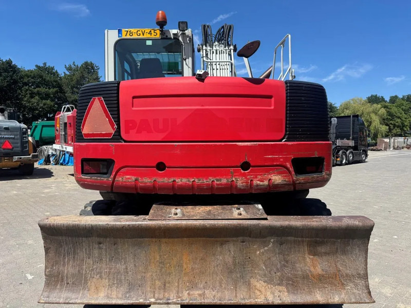Takeuchi TB1160W - حفارة على عجلات: صور 2 Takeuchi TB1160W - حفارة على عجلات: صور 2