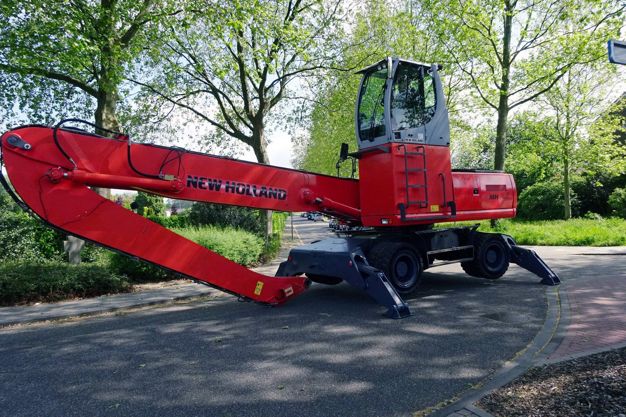 New Holland MH 6.6 With Multi Purpose Stick And Magnet System - حفارة النقل والشحن: صور 4 New Holland MH 6.6 With Multi Purpose Stick And Magnet System - حفارة النقل والشحن: صور 4