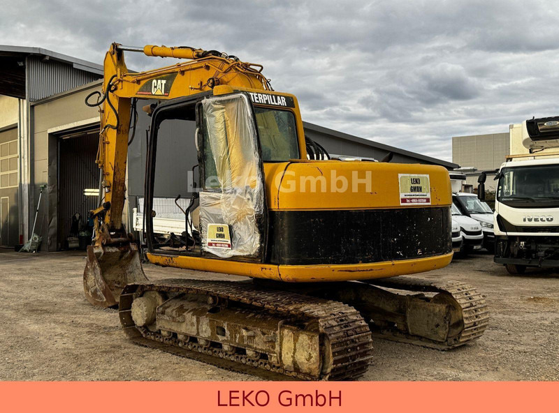 Caterpillar 311C Mit Zwei Löffeln - حفارات زحافة: صور 5 Caterpillar 311C Mit Zwei Löffeln - حفارات زحافة: صور 5