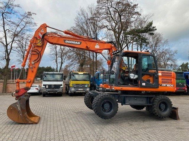 Doosan DX 160 W-3 - حفارة على عجلات: صور 5 Doosan DX 160 W-3 - حفارة على عجلات: صور 5